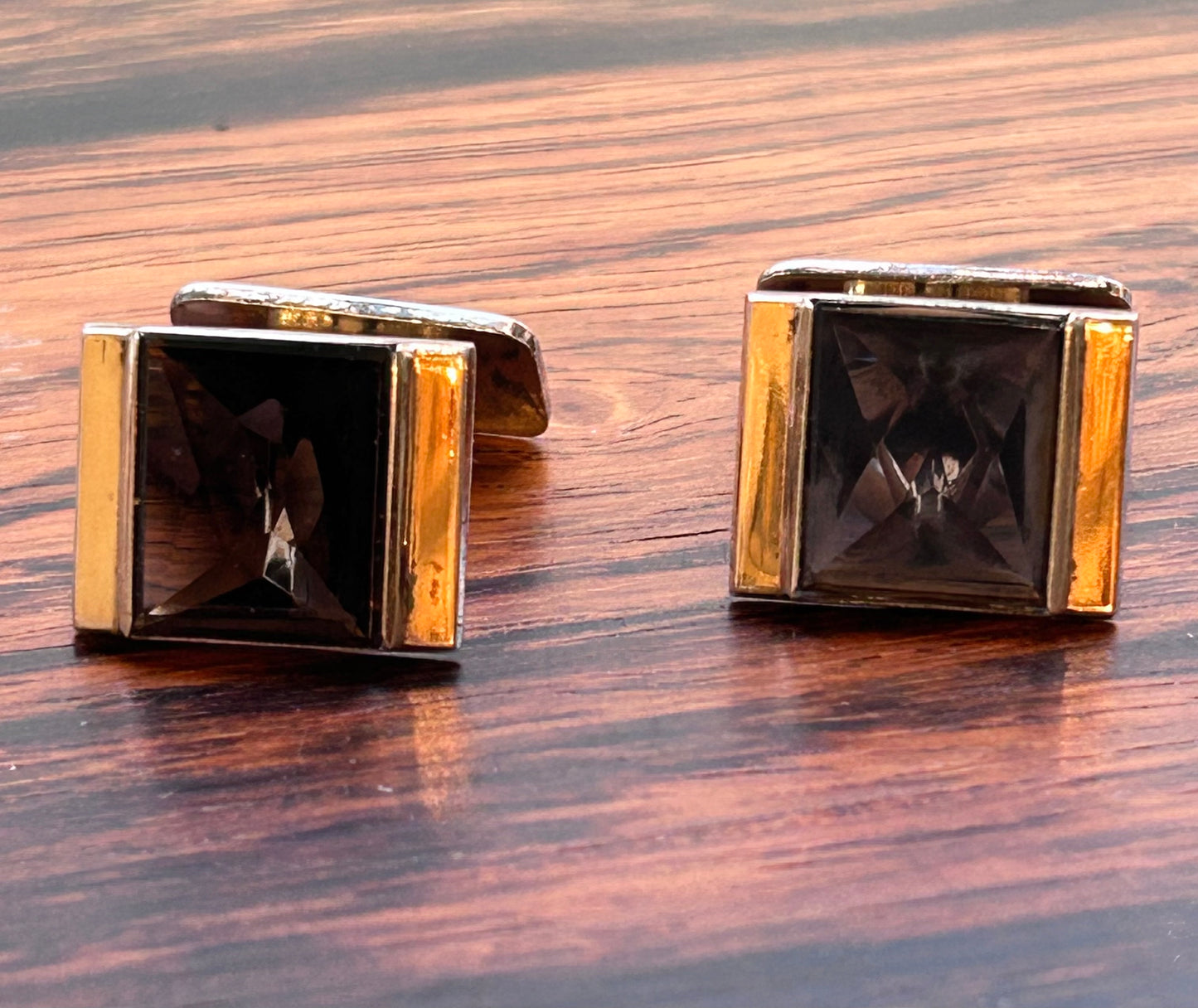 Silver Cufflinks with a star cut stone