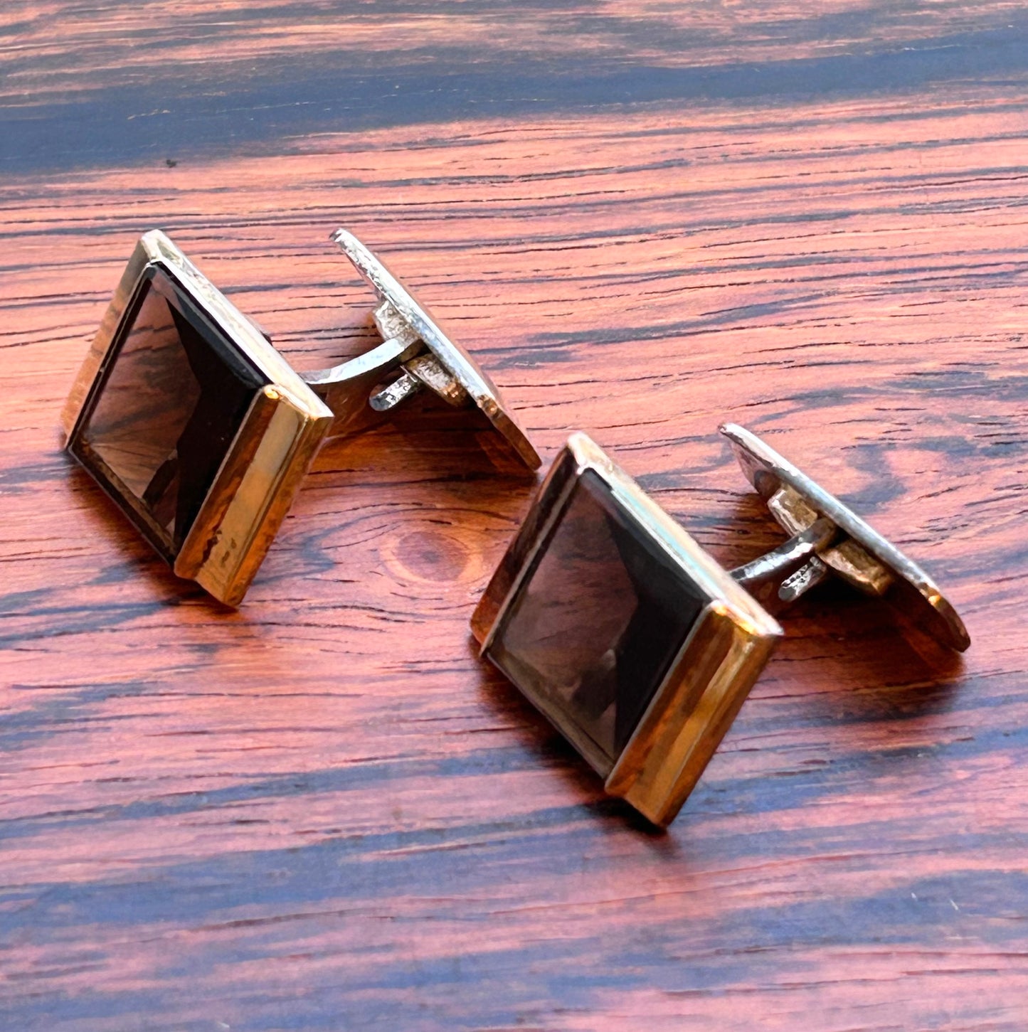 Silver Cufflinks with a star cut stone