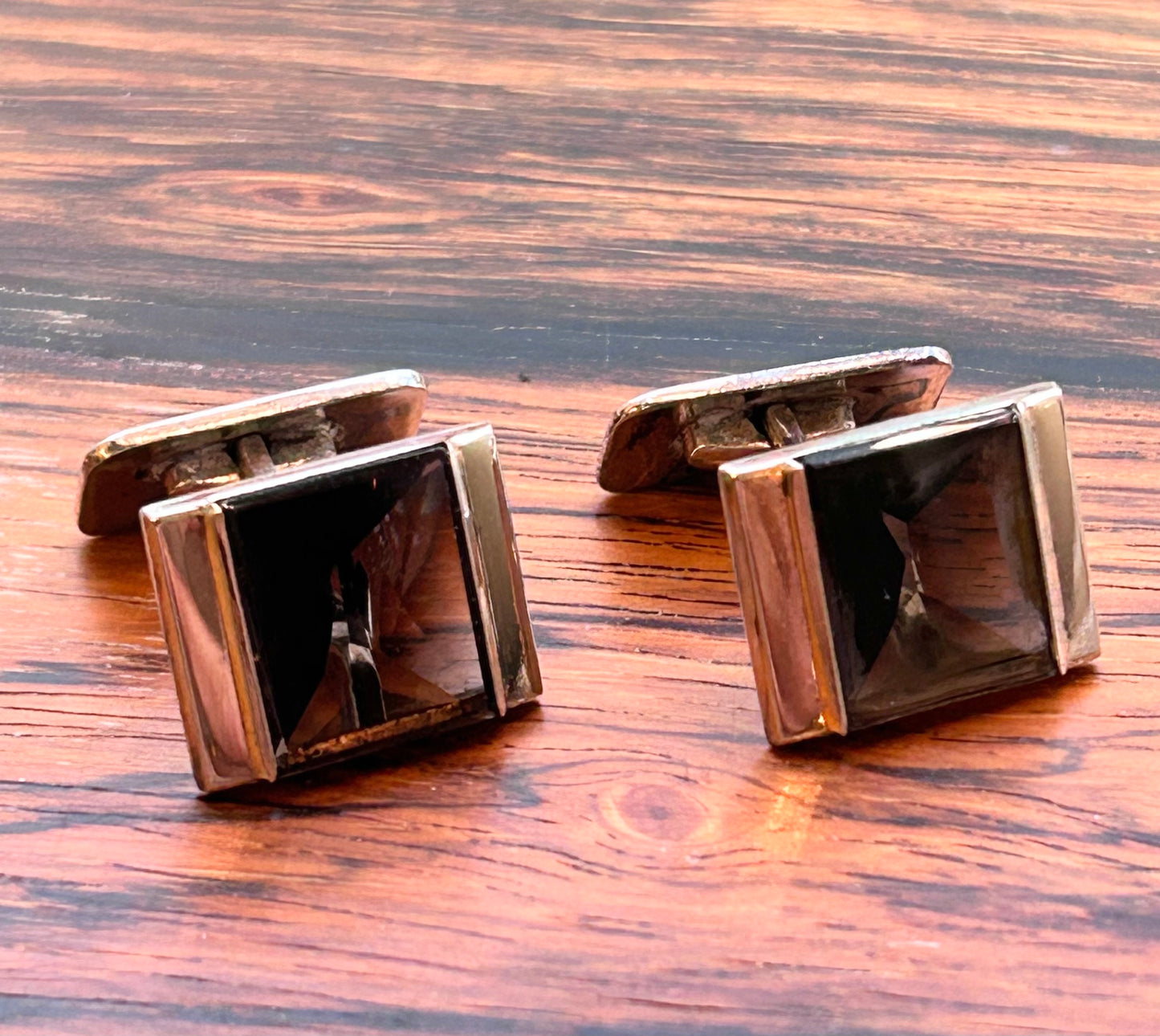 Silver Cufflinks with a star cut stone