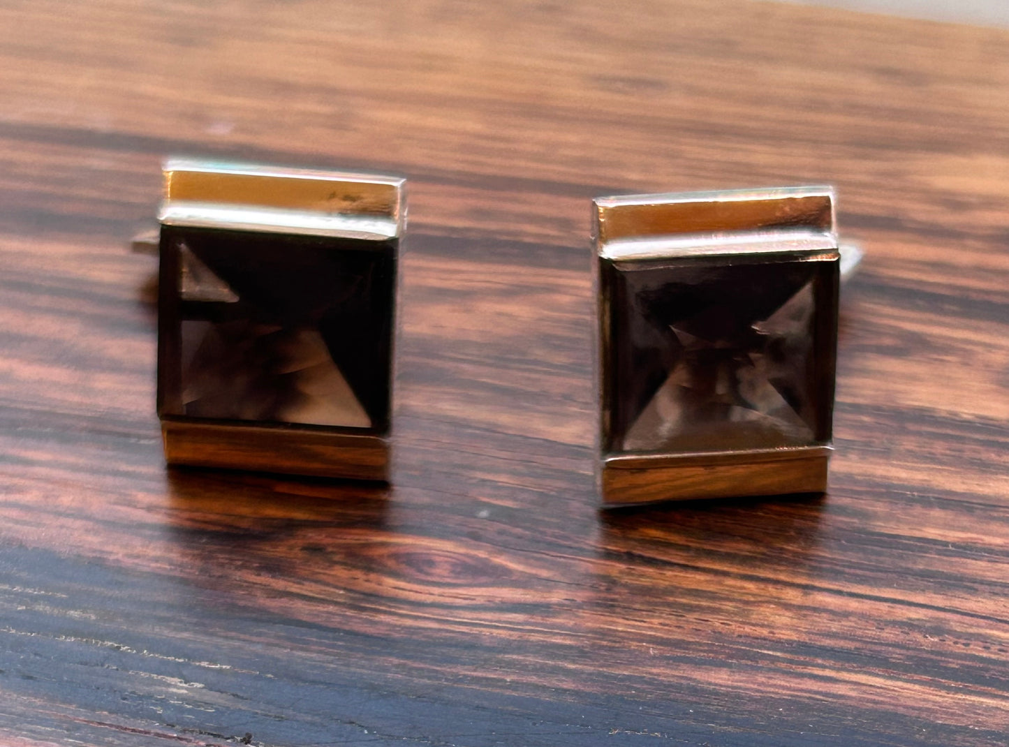 Silver Cufflinks with a star cut stone