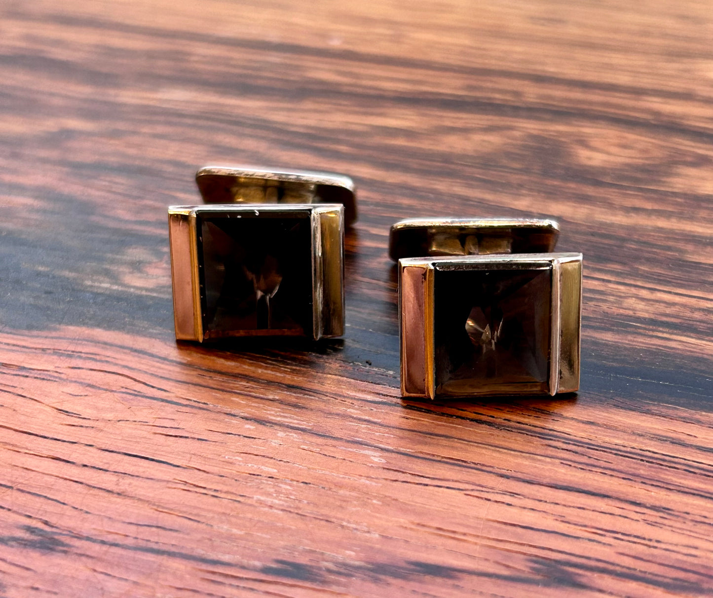 Silver Cufflinks with a star cut stone